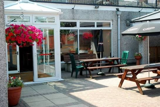 Outdoor tables in the club's beer garden