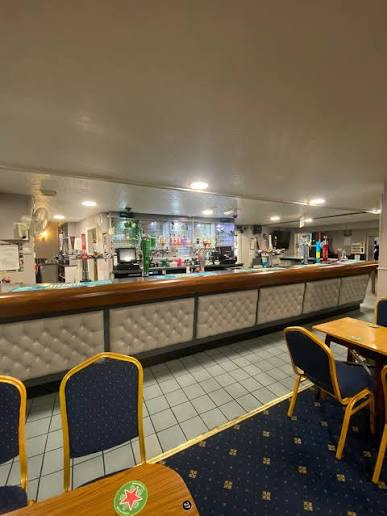 The main club bar, separate from the private function room